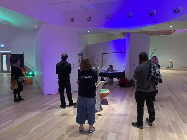 People standing around the Making Space in the Mead Gallery